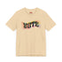 Election 2024 t-shirt with "VOTE" printed in large, colorful letters. Each letter features a different color from the rainbow spectrum, styled in a groovy 70s-inspired font.
